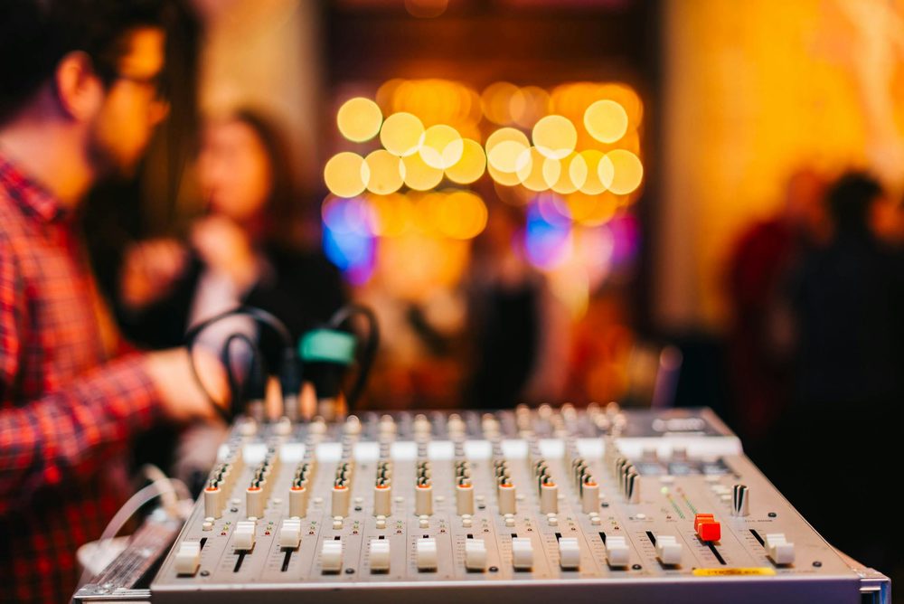 Audio mixer and event production equipment at a live event
